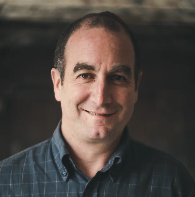 Formal headshot image of Jonny Malcolm
