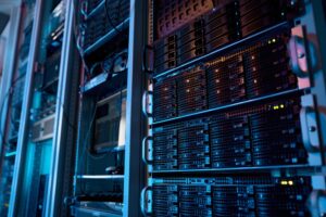 Close up of multiple racks in a modern data centre